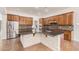 Modern kitchen with dark countertops and stainless steel appliances at 5713 W Rowel Rd, Phoenix, AZ 85083