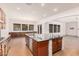 Open kitchen with large island and dark countertops at 5713 W Rowel Rd, Phoenix, AZ 85083