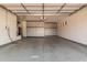 Spacious garage with overhead storage and epoxy floor at 5713 W Rowel Rd, Phoenix, AZ 85083