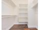 Large walk-in closet with built-in shelving at 5713 W Rowel Rd, Phoenix, AZ 85083