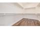 Well-organized closet with hanging rods and shelves at 5713 W Rowel Rd, Phoenix, AZ 85083