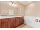 Double vanity bathroom with a large soaking tub at 13421 N 151St Dr, Surprise, AZ 85379