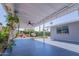 Covered patio with ceiling fan and fountain at 619 S Essex Ln, Mesa, AZ 85208