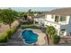Aerial view showcasing a house with a pool and landscaping at 3130 S Valle Verde Cir, Mesa, AZ 85212
