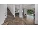 Grand entryway with herringbone floors and a view of the dining area at 3130 S Valle Verde Cir, Mesa, AZ 85212