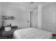 Cozy bedroom with a double bed and built-in desk at 3130 S Valle Verde Cir, Mesa, AZ 85212