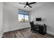 Home office with a desk, chair, and large window at 3130 S Valle Verde Cir, Mesa, AZ 85212