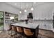 Modern kitchen with large island and stainless steel appliances at 3130 S Valle Verde Cir, Mesa, AZ 85212