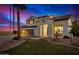 Two-story house with a two-car garage and a water fountain at 3130 S Valle Verde Cir, Mesa, AZ 85212