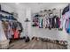 Large walk-in closet with ample shelving and hanging space at 3130 S Valle Verde Cir, Mesa, AZ 85212