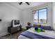 Comfortable bedroom with a double bed and window views at 3130 S Valle Verde Cir, Mesa, AZ 85212