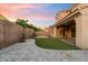 Backyard with putting green and patio at 4424 E Hartford Ave, Phoenix, AZ 85032