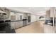 Updated kitchen featuring granite countertops and a breakfast bar at 7012 N 22Nd St, Phoenix, AZ 85020
