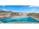 Inviting swimming pool with safety fence in backyard at 7012 N 22Nd St, Phoenix, AZ 85020