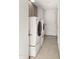 Laundry room with washer, dryer, and tile flooring at 7012 N 22Nd St, Phoenix, AZ 85020