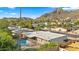 Aerial view showing home, pool, and mountain views at 7012 N 22Nd St, Phoenix, AZ 85020