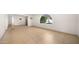 Open living room with tile flooring and arched window at 7012 N 22Nd St, Phoenix, AZ 85020