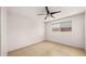 Spacious bedroom featuring tile floors and a ceiling fan at 7012 N 22Nd St, Phoenix, AZ 85020