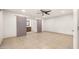 Bedroom with barn doors leading to en-suite bathroom at 7012 N 22Nd St, Phoenix, AZ 85020