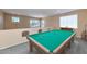 Game room with a pool table and plenty of space at 3437 W Thoreau Ln, Anthem, AZ 85086