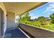 Private balcony overlooking lush green trees at 6116 N 12Th Pl # 7, Phoenix, AZ 85014