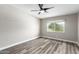 Bedroom with wood-look floors and ceiling fan at 6116 N 12Th Pl # 7, Phoenix, AZ 85014