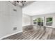 Large living area with hardwood floors and sliding glass doors at 6116 N 12Th Pl # 7, Phoenix, AZ 85014
