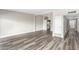 Spacious living area with hardwood floors and access to hallway at 6116 N 12Th Pl # 7, Phoenix, AZ 85014