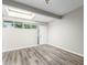 Spacious living area with a skylight and wood-look floors at 6116 N 12Th Pl # 7, Phoenix, AZ 85014