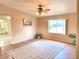 Living room with hardwood floors and ceiling fan at 3349 N Ralston Rd, Maricopa, AZ 85139