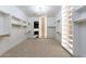 Spacious walk-in closet with custom shelving and lighting at 9633 E Quarter Circle Loop, Gold Canyon, AZ 85118