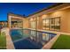 Resort-style pool and patio with views into the home's interior at 9633 E Quarter Circle Loop, Gold Canyon, AZ 85118