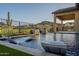 Resort-style pool with swim-up loungers and water features at 9633 E Quarter Circle Loop, Gold Canyon, AZ 85118