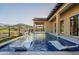 Modern pool with built-in lounge chairs and mountain views at 9633 E Quarter Circle Loop, Gold Canyon, AZ 85118