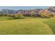 Golf course view with mountain backdrop at 9633 E Quarter Circle Loop, Gold Canyon, AZ 85118