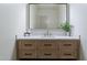 Modern bathroom with a sleek vanity and large mirror at 9633 E Quarter Circle Loop, Gold Canyon, AZ 85118