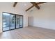 Spacious bedroom with wood floors and access to the backyard at 9633 E Quarter Circle Loop, Gold Canyon, AZ 85118