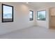 Bright bedroom with mountain views, neutral walls, and plush carpeting at 9633 E Quarter Circle Loop, Gold Canyon, AZ 85118