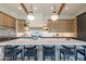 Modern kitchen with large island and two-toned cabinetry at 9633 E Quarter Circle Loop, Gold Canyon, AZ 85118