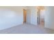Bright bedroom with carpet and access to bathroom at 9633 E Quarter Circle Loop, Gold Canyon, AZ 85118