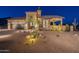Front view of a beautiful, single-story home with desert landscaping at 9633 E Quarter Circle Loop, Gold Canyon, AZ 85118