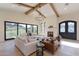 Open living space with large windows, fireplace, and impressive architectural details at 9633 E Quarter Circle Loop, Gold Canyon, AZ 85118