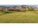 Golf course view with mountain backdrop at 9633 E Quarter Circle Loop, Gold Canyon, AZ 85118