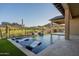 Luxury pool with spa, fountains, and mountain backdrop at 9633 E Quarter Circle Loop, Gold Canyon, AZ 85118