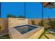 Private backyard hot tub with stone surround at 9633 E Quarter Circle Loop, Gold Canyon, AZ 85118