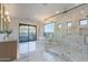 Luxurious bathroom with marble flooring, soaking tub, and shower at 9633 E Quarter Circle Loop, Gold Canyon, AZ 85118