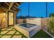 Private backyard hot tub with stone surround and mountain views at 9633 E Quarter Circle Loop, Gold Canyon, AZ 85118
