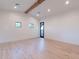 Large bedroom with wood flooring, high ceilings, and access to a private patio at 9633 E Quarter Circle Loop, Gold Canyon, AZ 85118