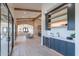 Elegant wet bar with wine cooler and custom cabinetry at 9633 E Quarter Circle Loop, Gold Canyon, AZ 85118