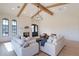Elegant living room with hardwood floors, fireplace, and statement entry doors at 9633 E Quarter Circle Loop, Gold Canyon, AZ 85118